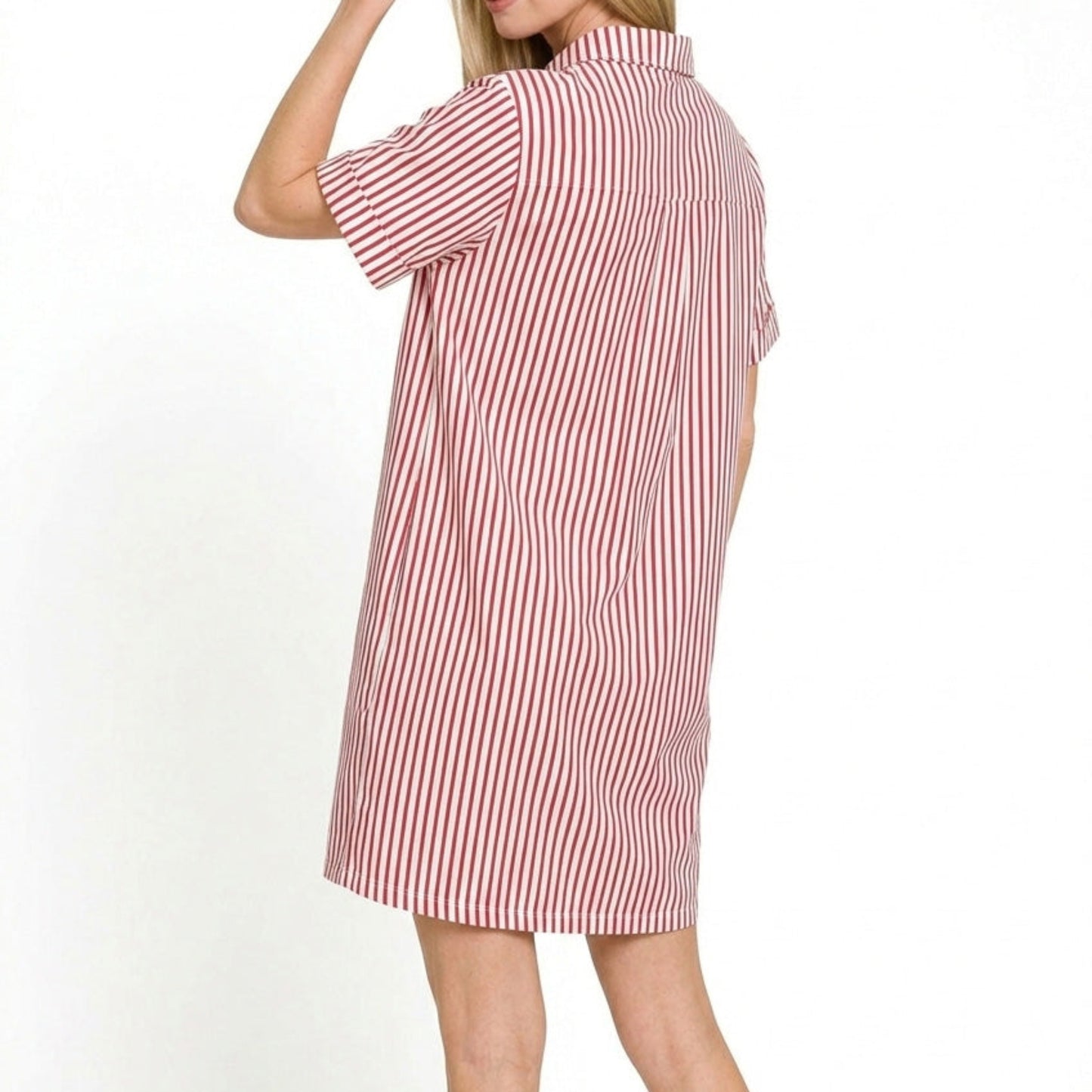 Lifestyle view of the Ruby striped collared dress styled for a chic, vibrant coastal look.