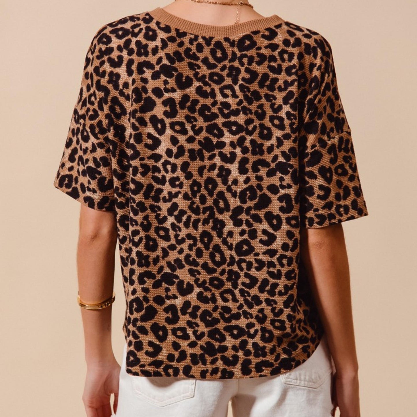 Back view of the SO ME coffee leopard waffle knit loose fit top.