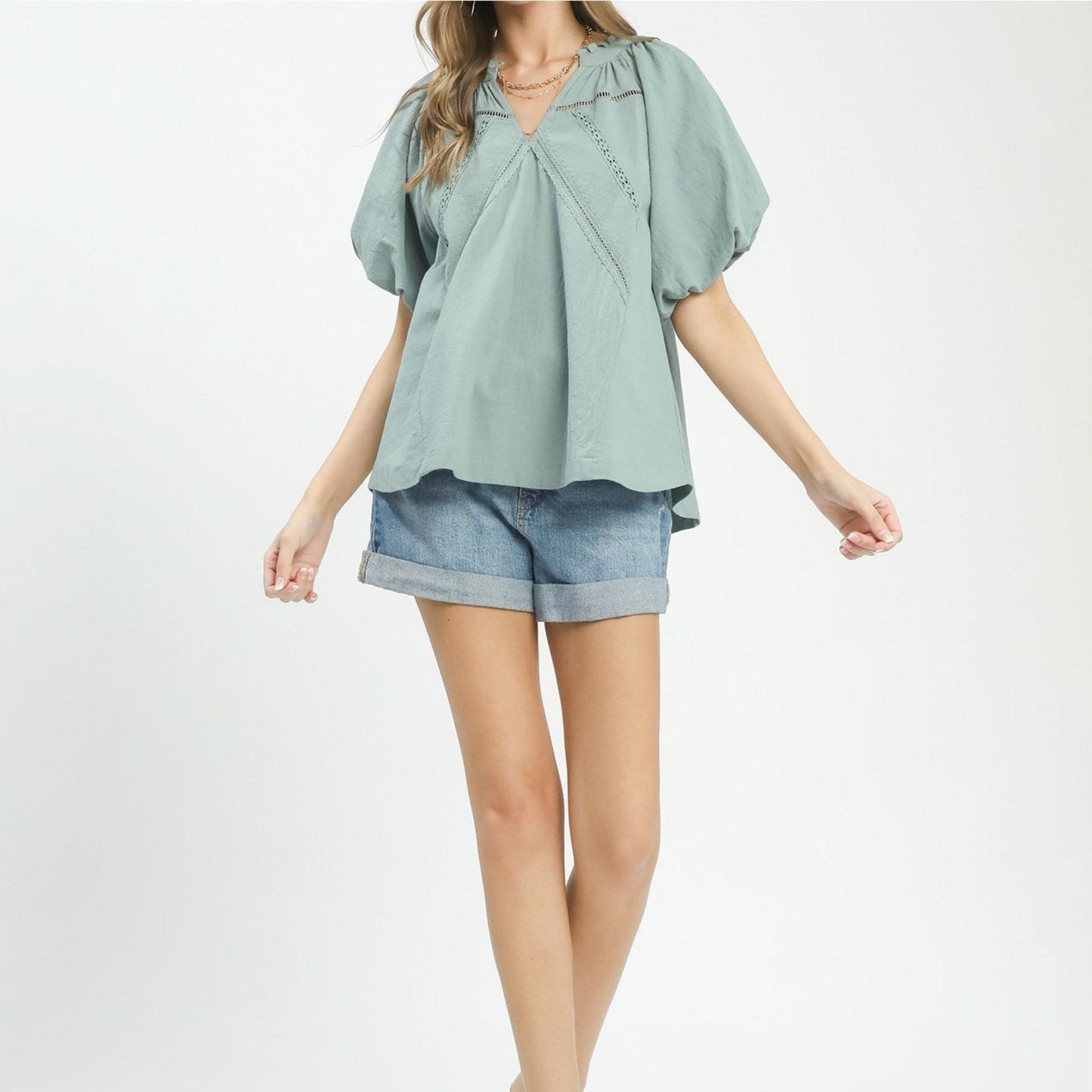 Full-length view of the Umgee mint blue puff sleeve top styled for a summer boho look.