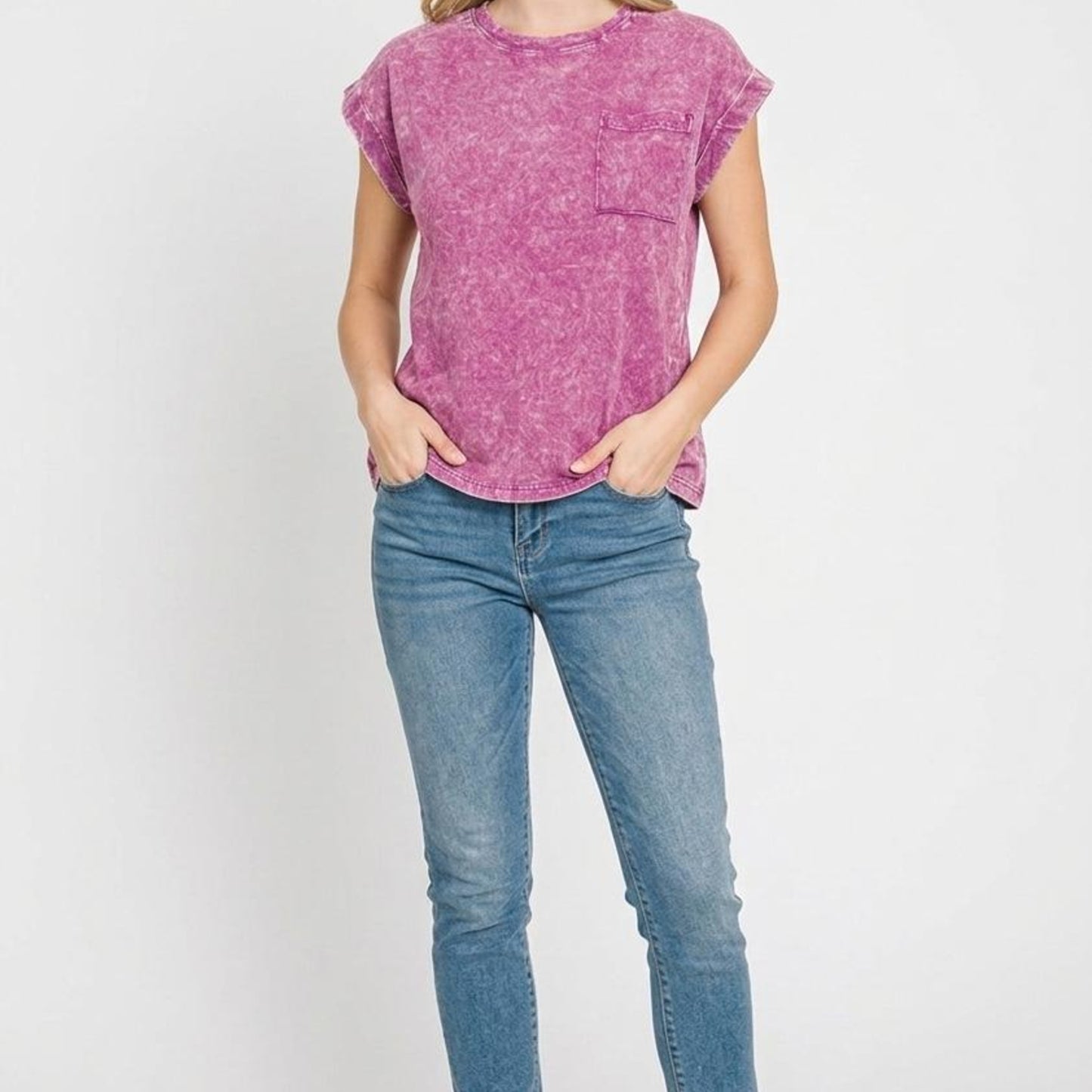 Lifestyle view of the Zenana light plum folded sleeve tee showing the relaxed boutique fit.