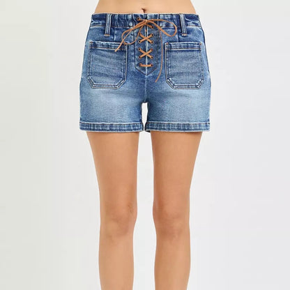 RISEN High Rise Front Tie Up Shorts with Patch Pockets in Medium Wash - Lifestyle View 1