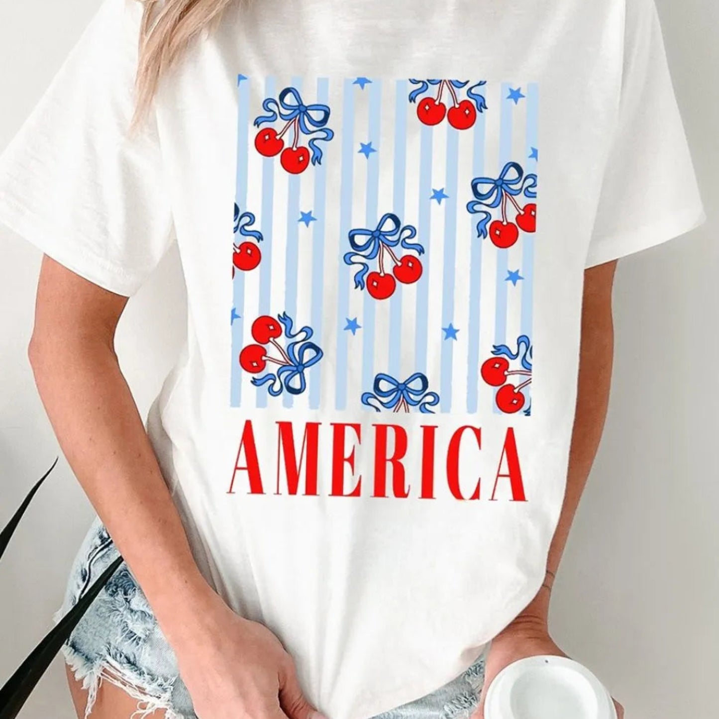 Bow Cherry AMERICA Graphic Crewneck Patriotic T-Shirt in White - Lifestyle View 2
