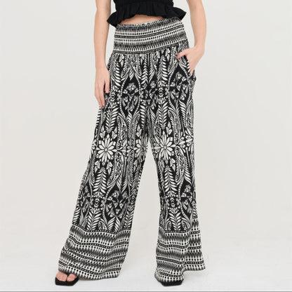 Smocked Waist Floral Pants in Black - Lifestyle View
