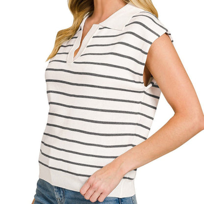 Woman wearing a striped shirt with a plain background