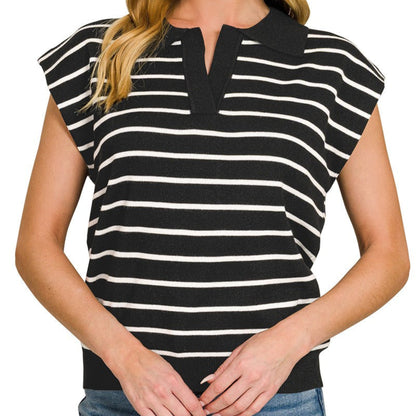 Woman wearing a black and white striped shirt with short sleeves on a white background