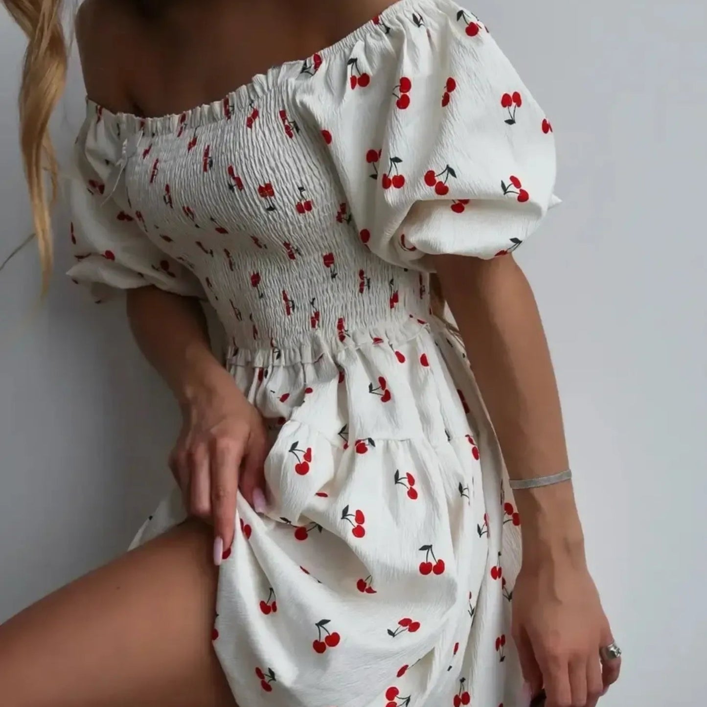 Puff Sleeve Cherry Print Smocked Mini Dress in White - Side View