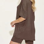 Chocolate tee with matching shorts on a plain background