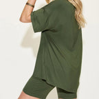 Person wearing a matcha green outfit with a plain background