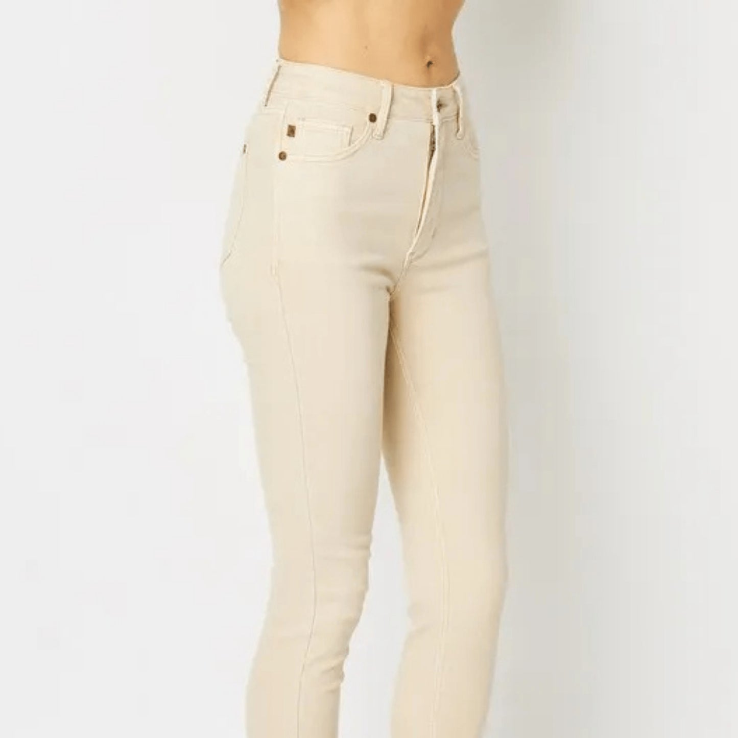 Side view showcasing the flattering fit of the Bone skinny jeans.