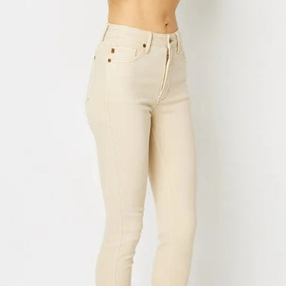 Side view showcasing the flattering fit of the Bone skinny jeans.
