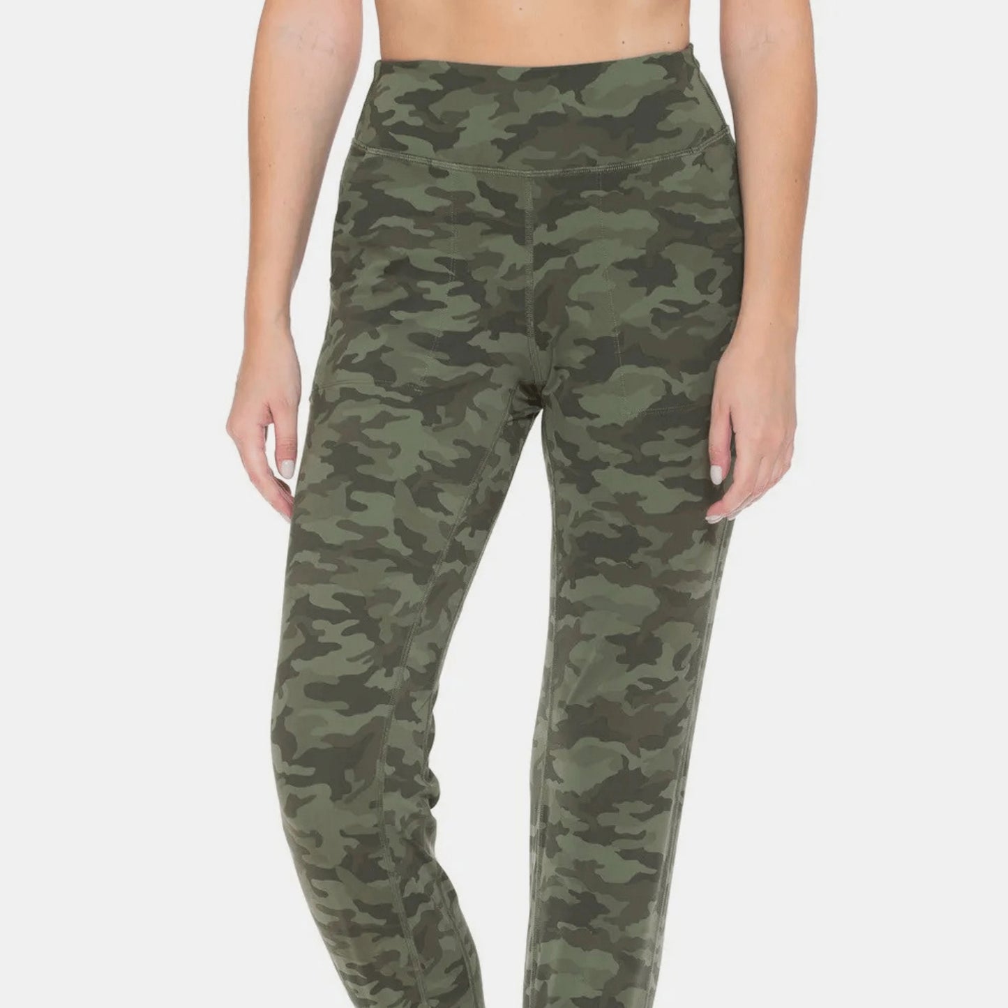 Front view of high-waist camo leggings highlighting the flattering smoothing waistband.