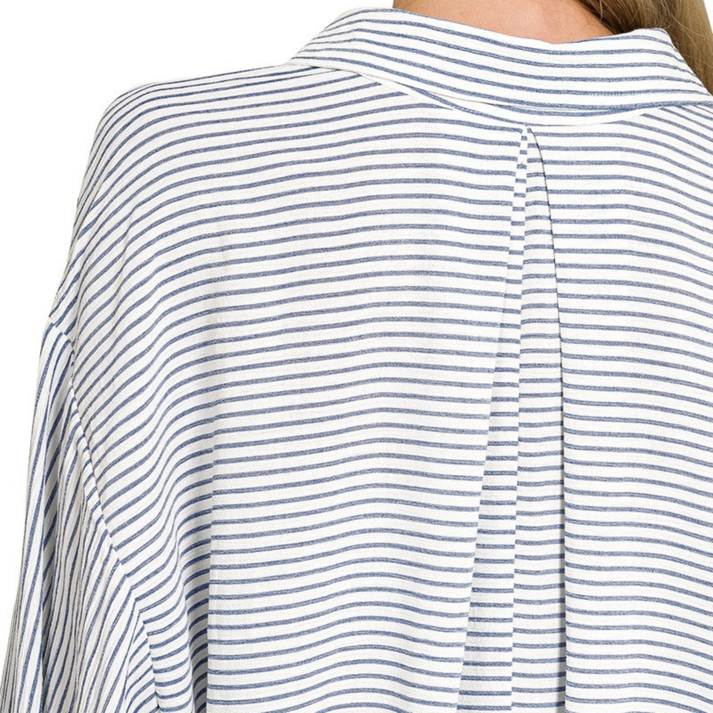 Rear view of the striped woven shirt highlighting the clean lines and comfortable drape.