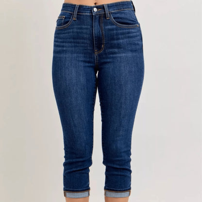Frontal view of high-waist cuffed capri jeans showing the flattering rise.
