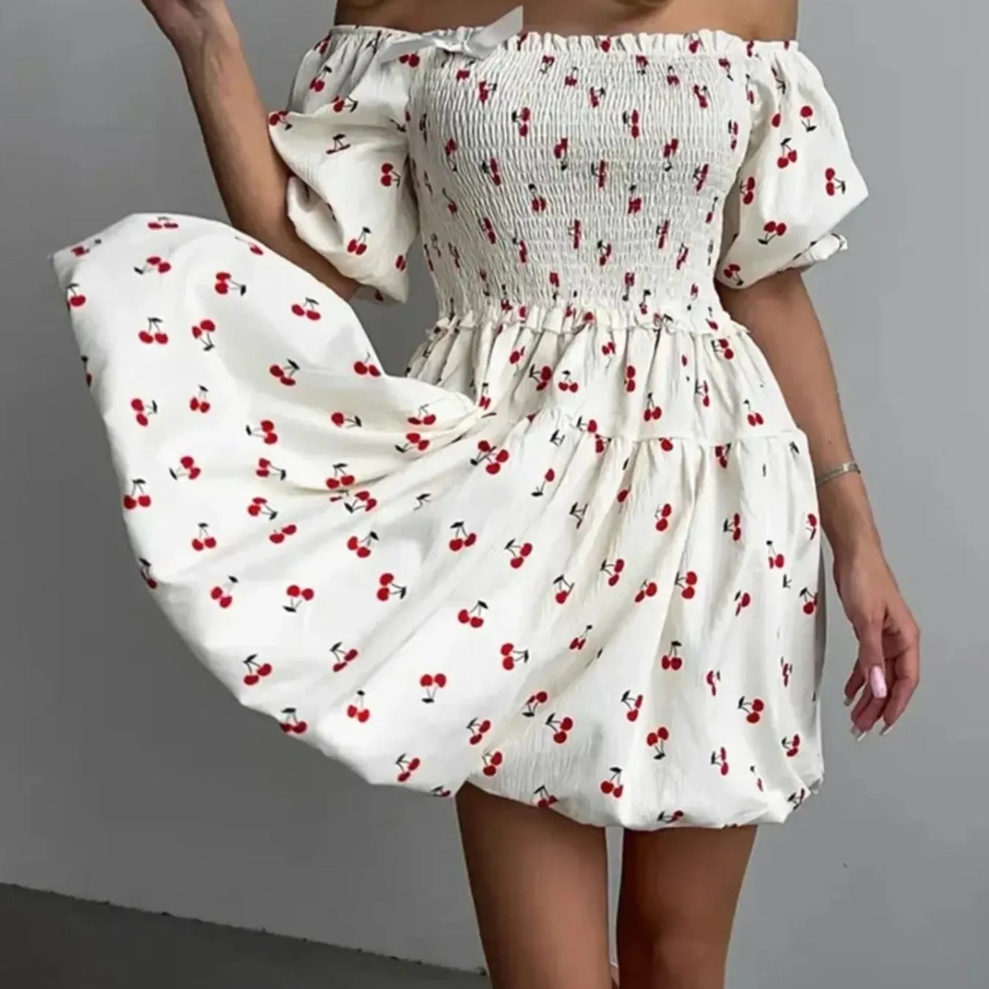 Puff Sleeve Cherry Print Smocked Mini Dress in White - Front View