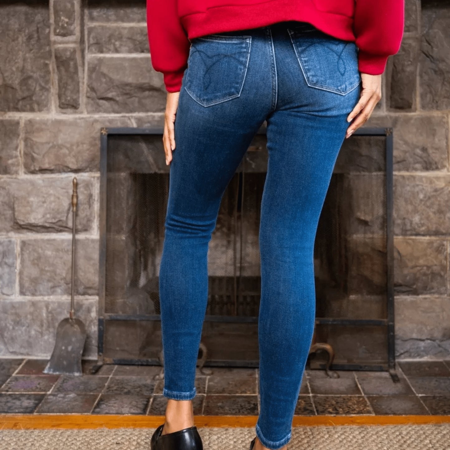 Back view of Judy Blue thermal skinny jeans showing the classic pocket design and dark wash finish.