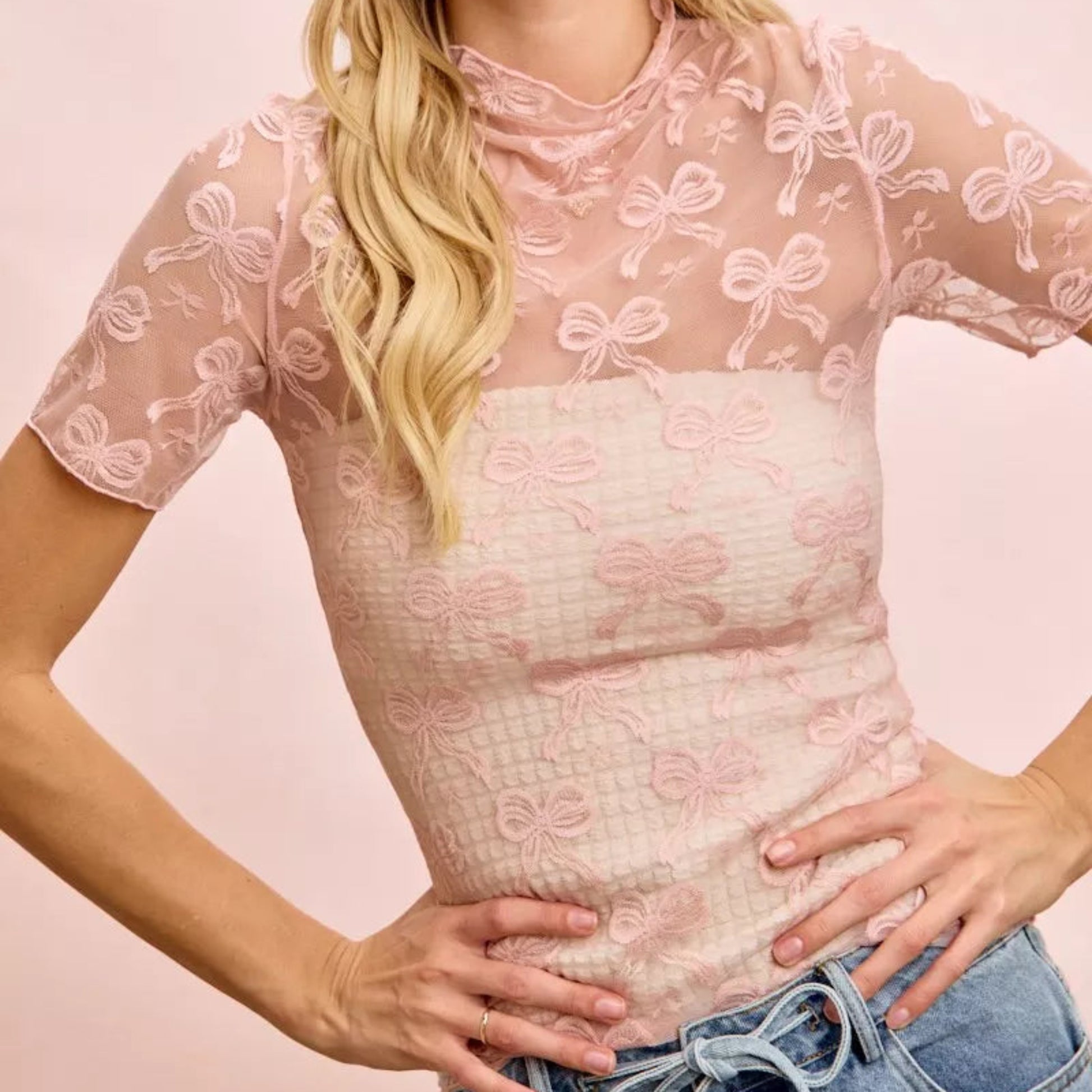 BiBi High Neckline Bow Pattern Mesh Top in Dusty Rose - Lifestyle View 1