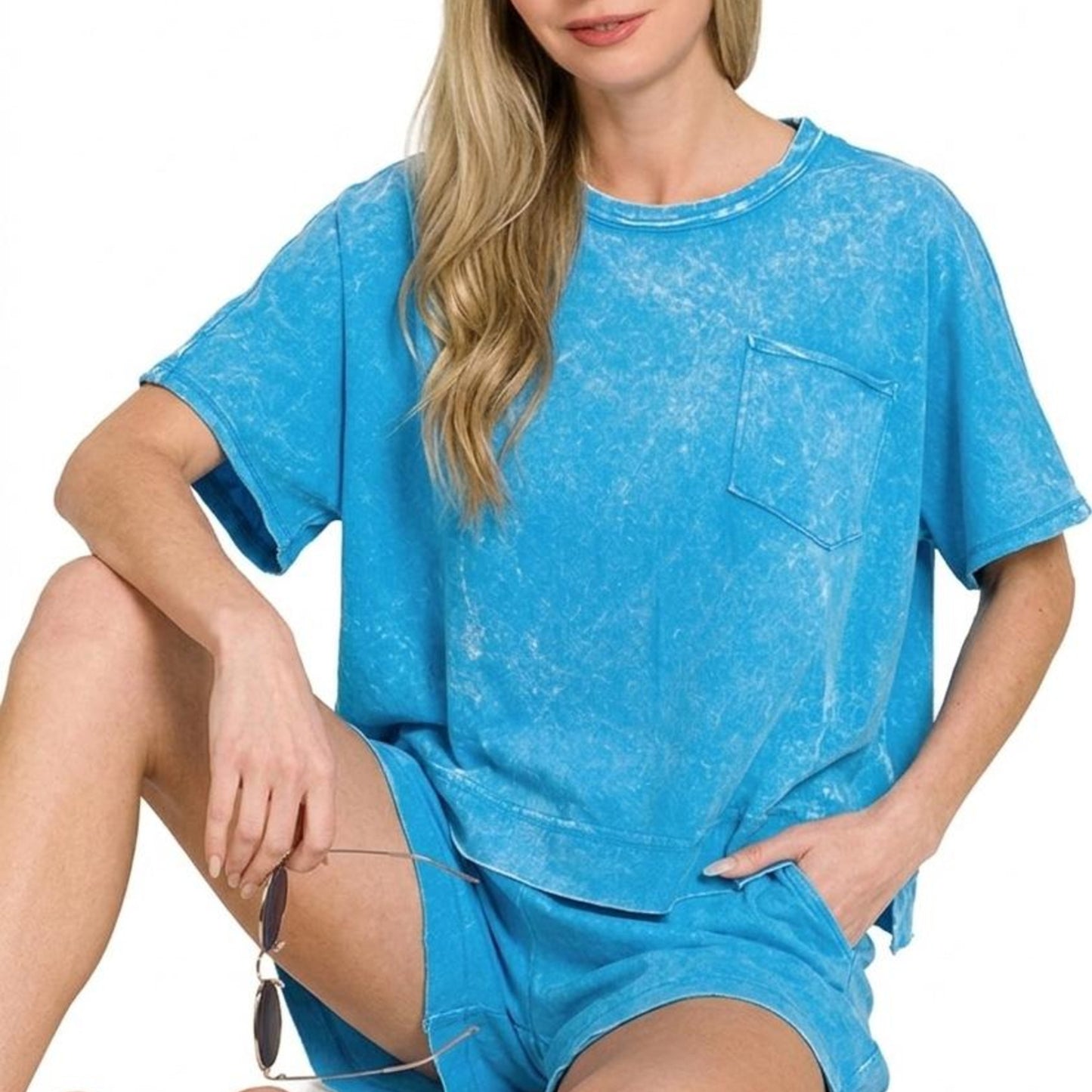 Lifestyle view of the Deep Sky acid-wash matching set with oversized top.
