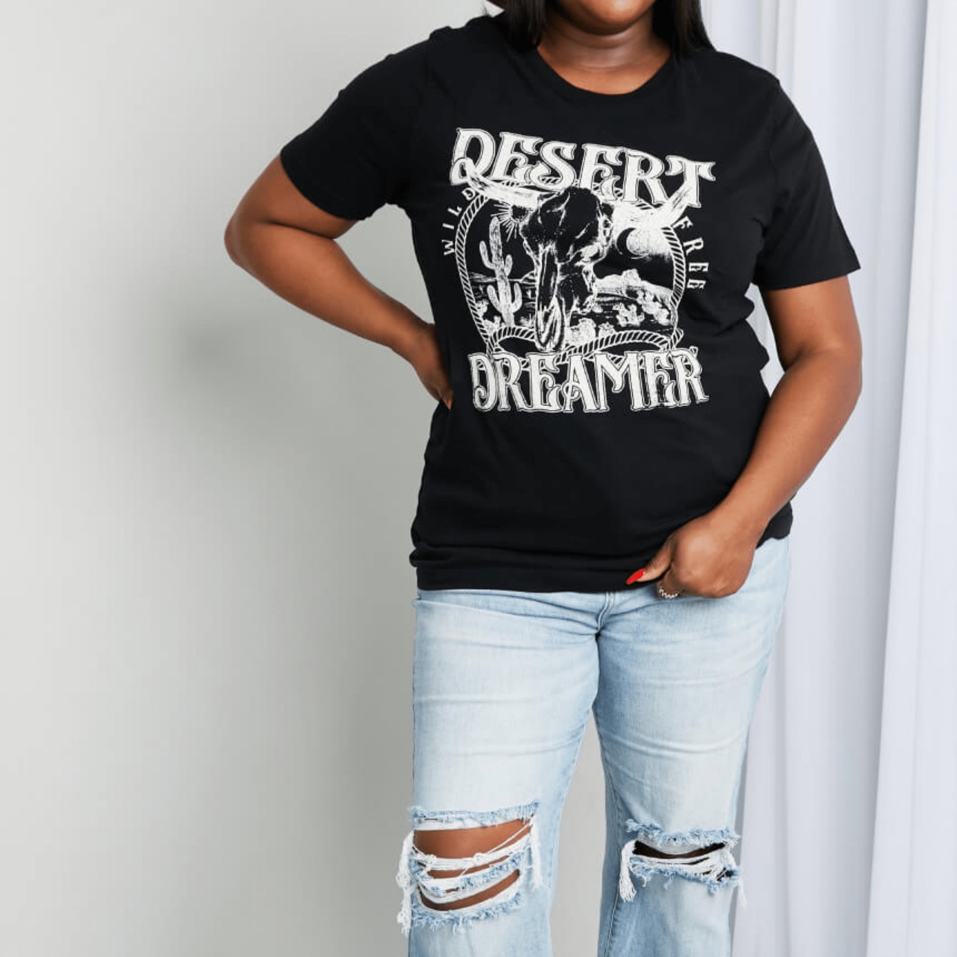 Complete boutique presentation of the Desert Dreamer tee with Western-inspired accessories.
