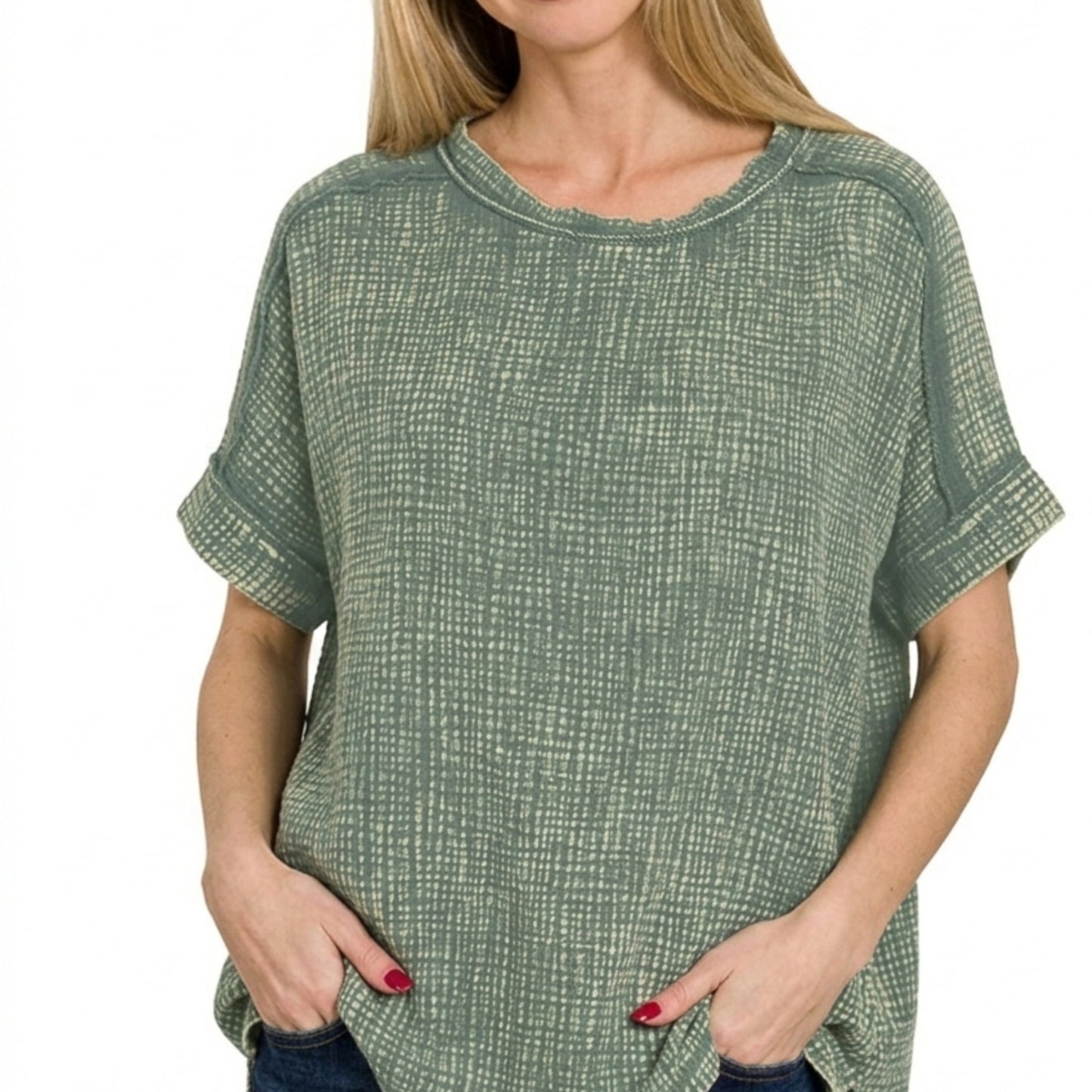 Close-up of the crinkled 100% cotton double gauze fabric and acid-wash detail.