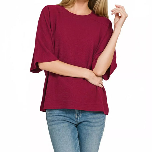 Lifestyle styling view of the Zenana polished double knit top in Cabernet.