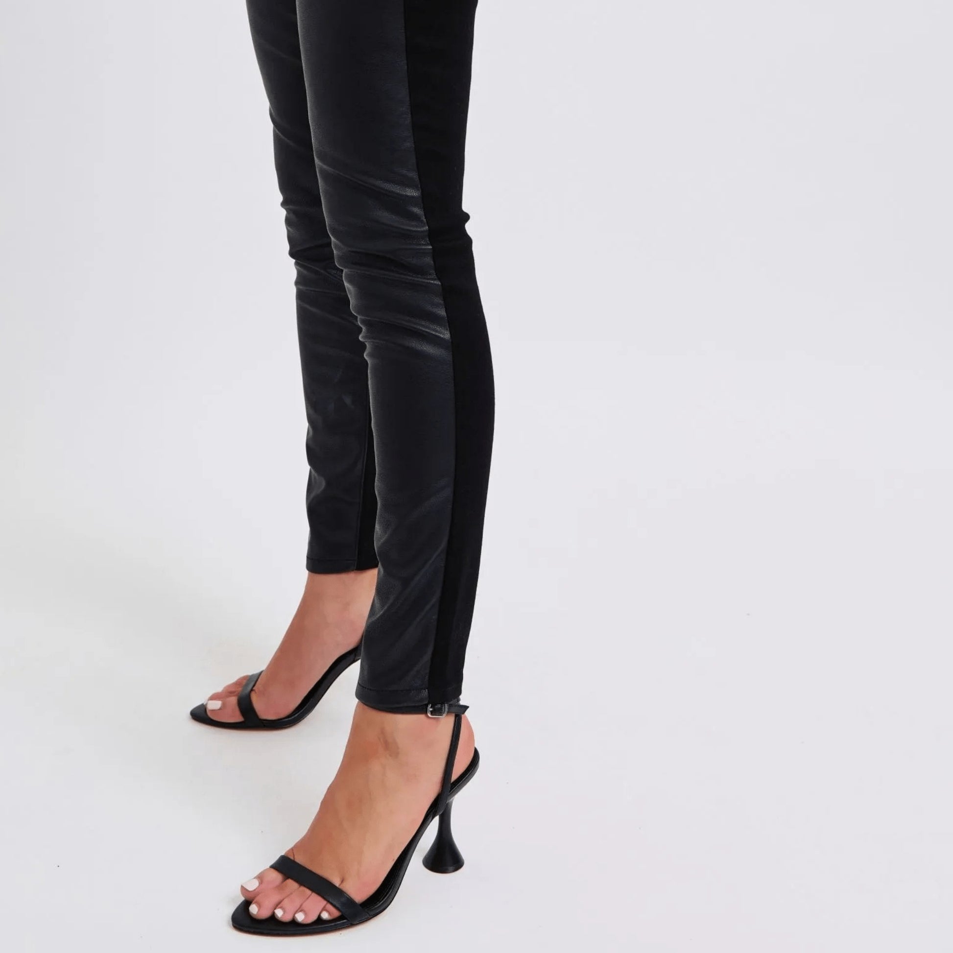 Detailed view of the buttery-soft faux leather material and high-quality stitching.