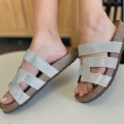 Full-length view of the Forever Link silver rhinestone sandals showcasing the elegant silhouette.