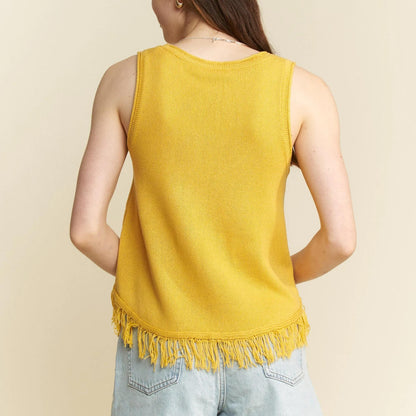Back view of the mustard yellow sleeveless top showing the relaxed silhouette.