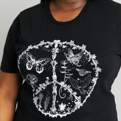 Complete boutique presentation of a black butterfly print tee and light-wash denim.