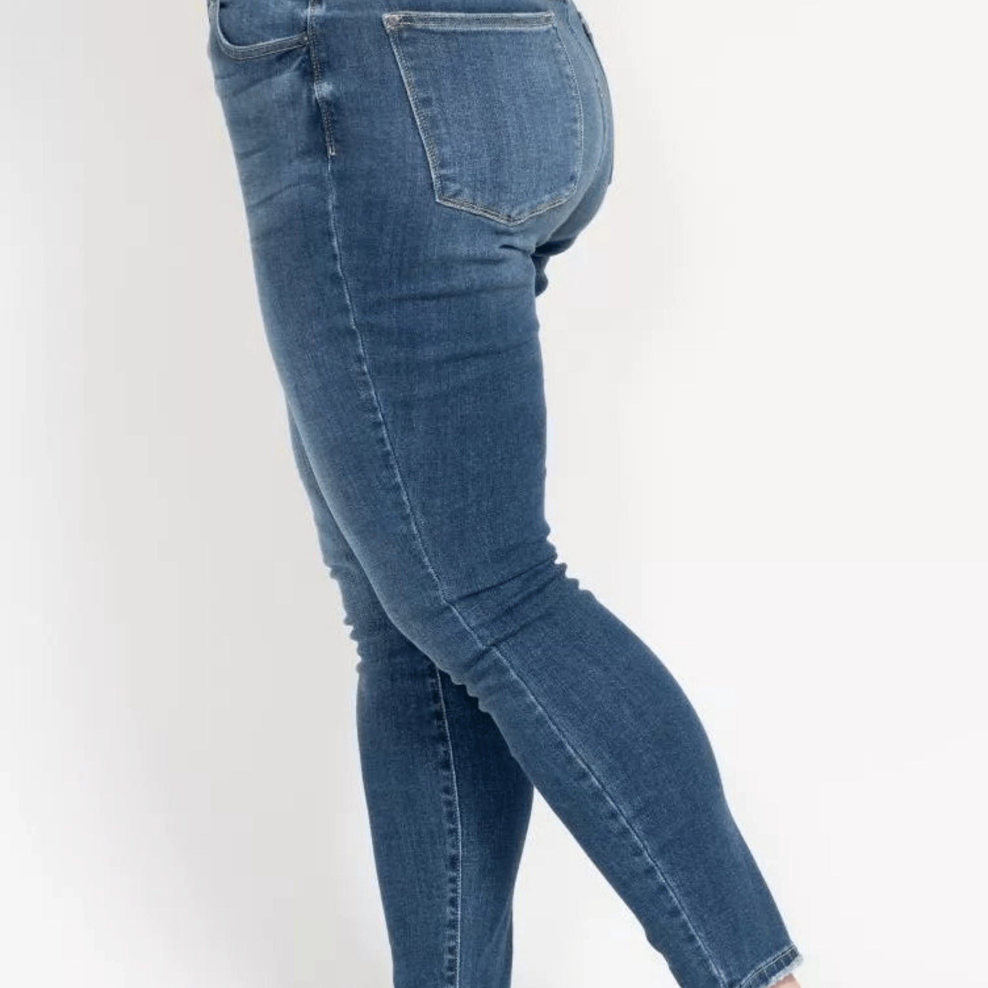Styling example featuring Judy Blue button-fly skinny jeans.