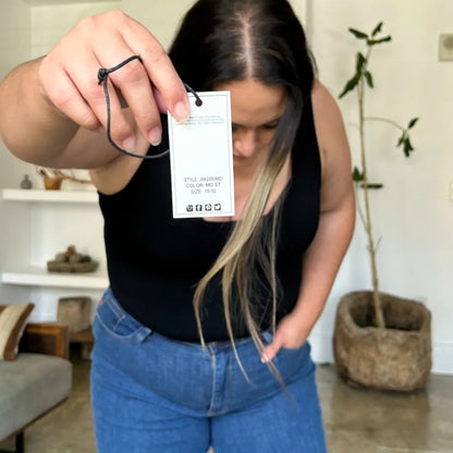 Close-up view of the Judy Blue brand label and high-waist detail.