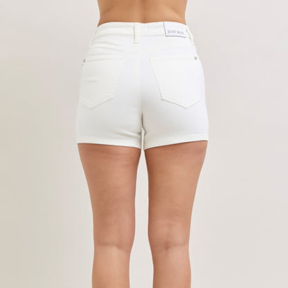Back view of white Judy Blue shorts highlighting the high waistband and pocket design.