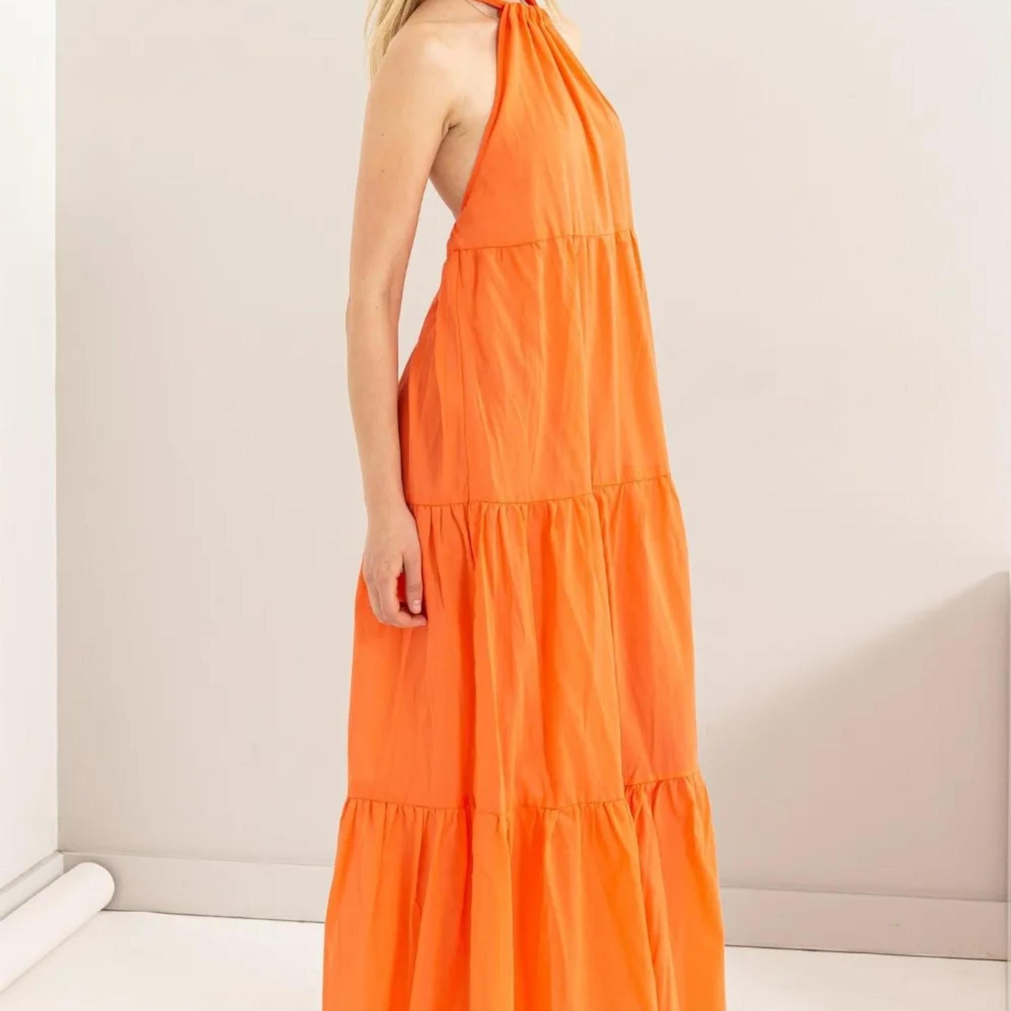 Front view of the HYFVE Orange halter neck cover up maxi dress.