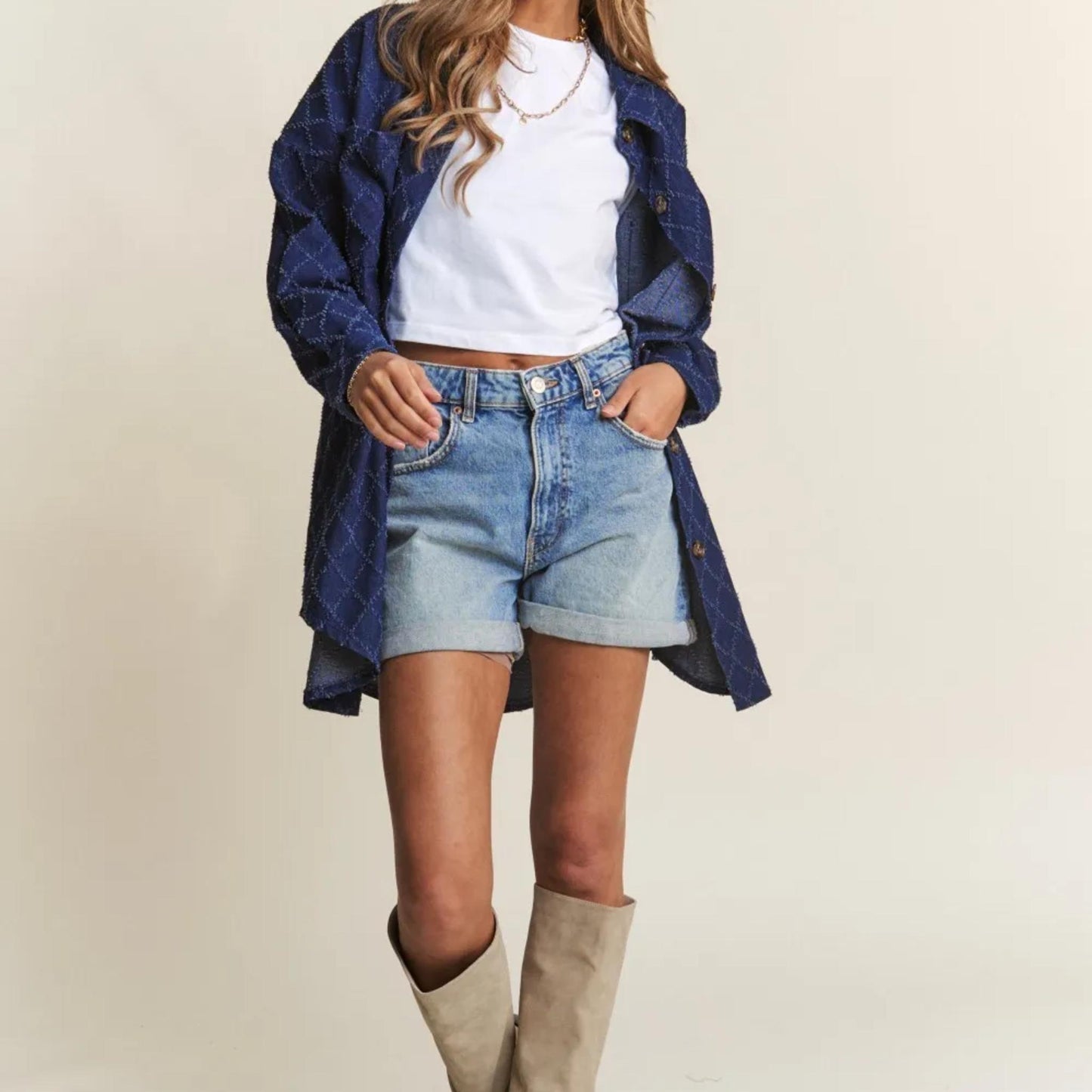 Lifestyle view of the J.NNA denim shacket styled for an effortless, chic outfit.