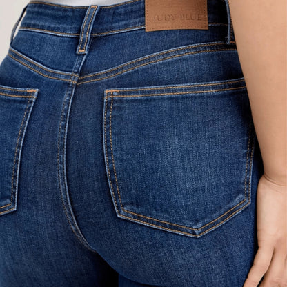 Close-up of Judy Blue cuffed capri jeans showing the brand label and wash.