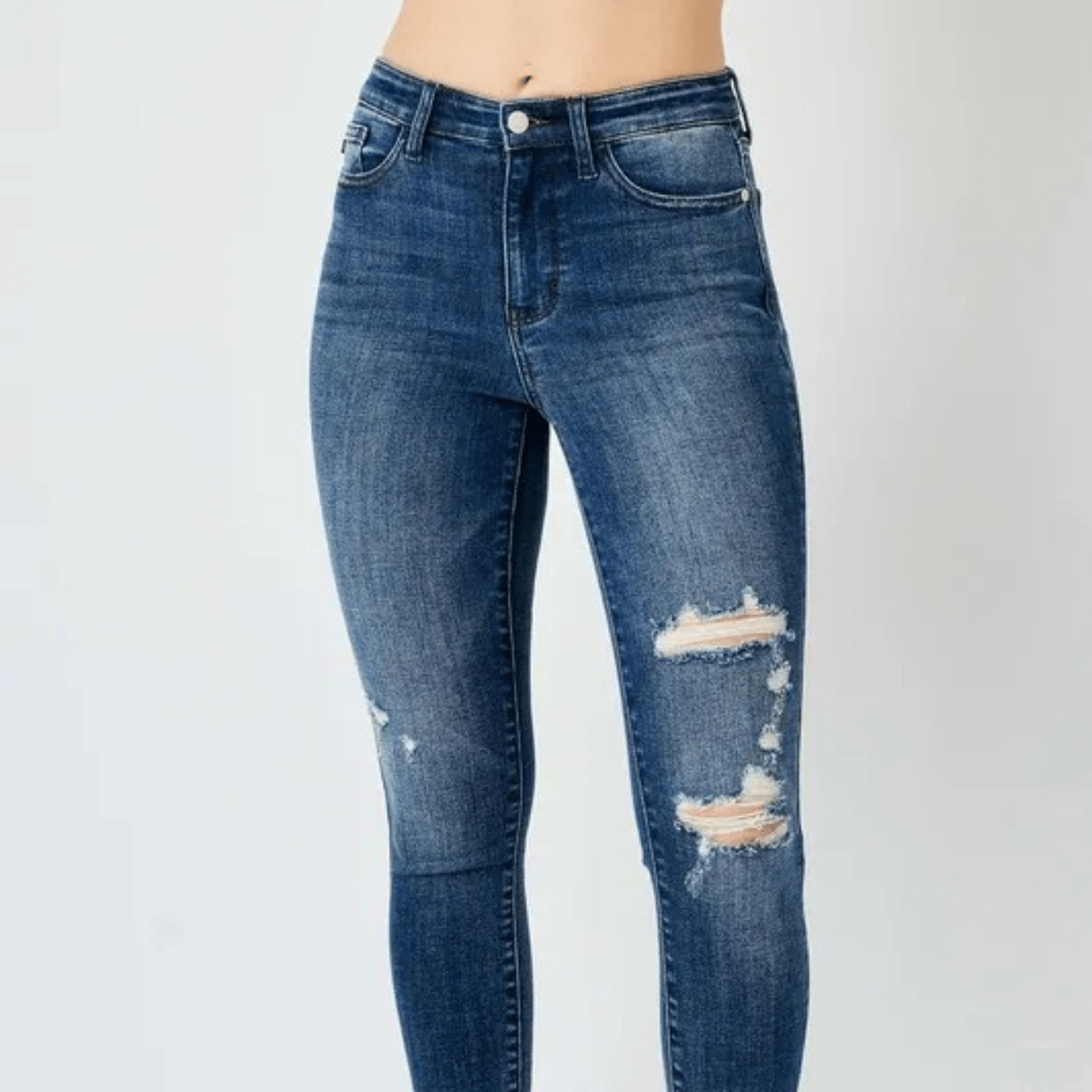 Full view of Judy Blue high-waist distressed skinny jeans in dark wash.