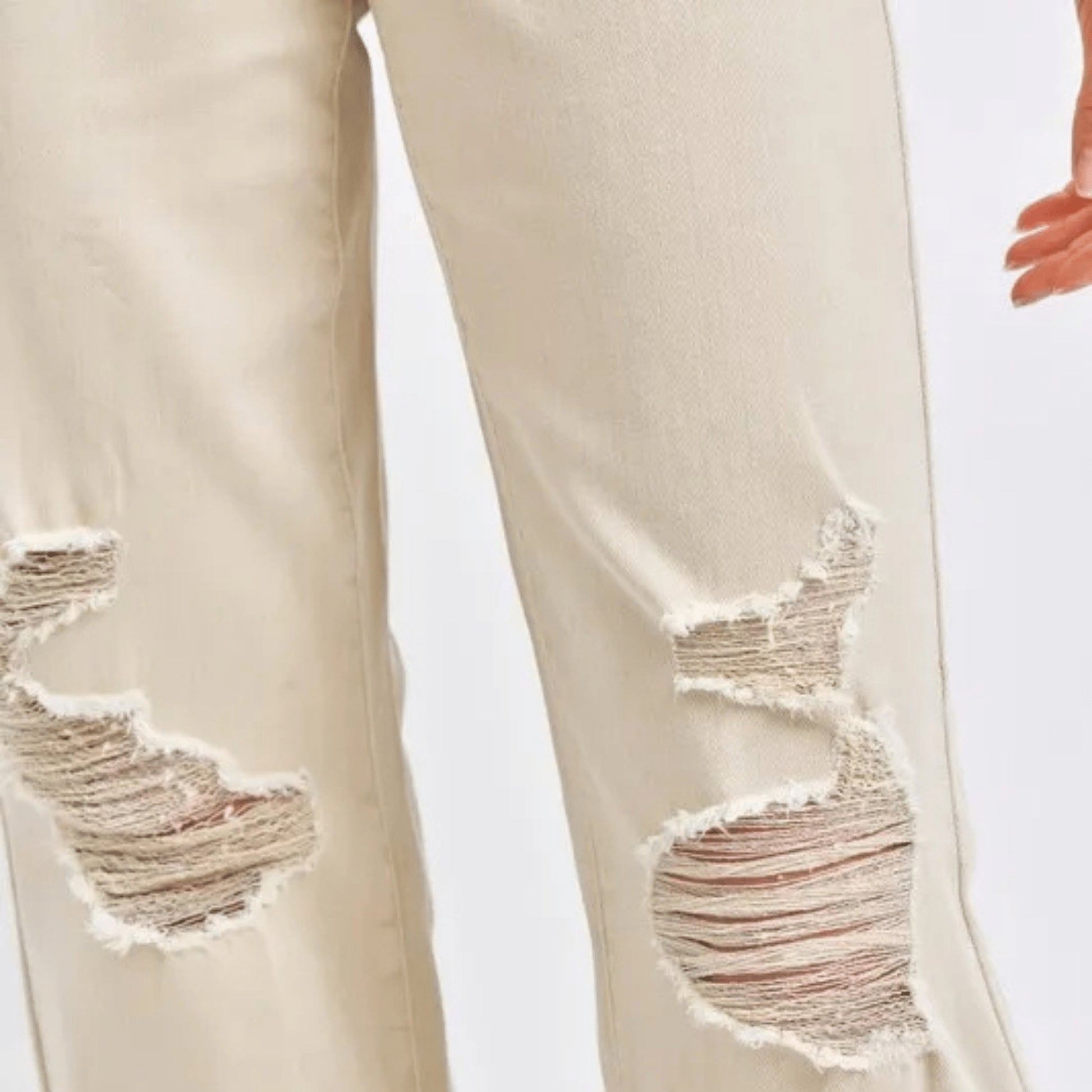 Beige distressed wide-leg jeans by Judy Blue on a white background.