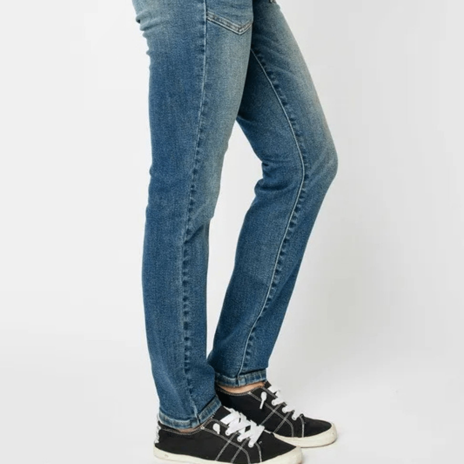 Full body shot of a person wearing Judy Blue high-waist skinny jeans.