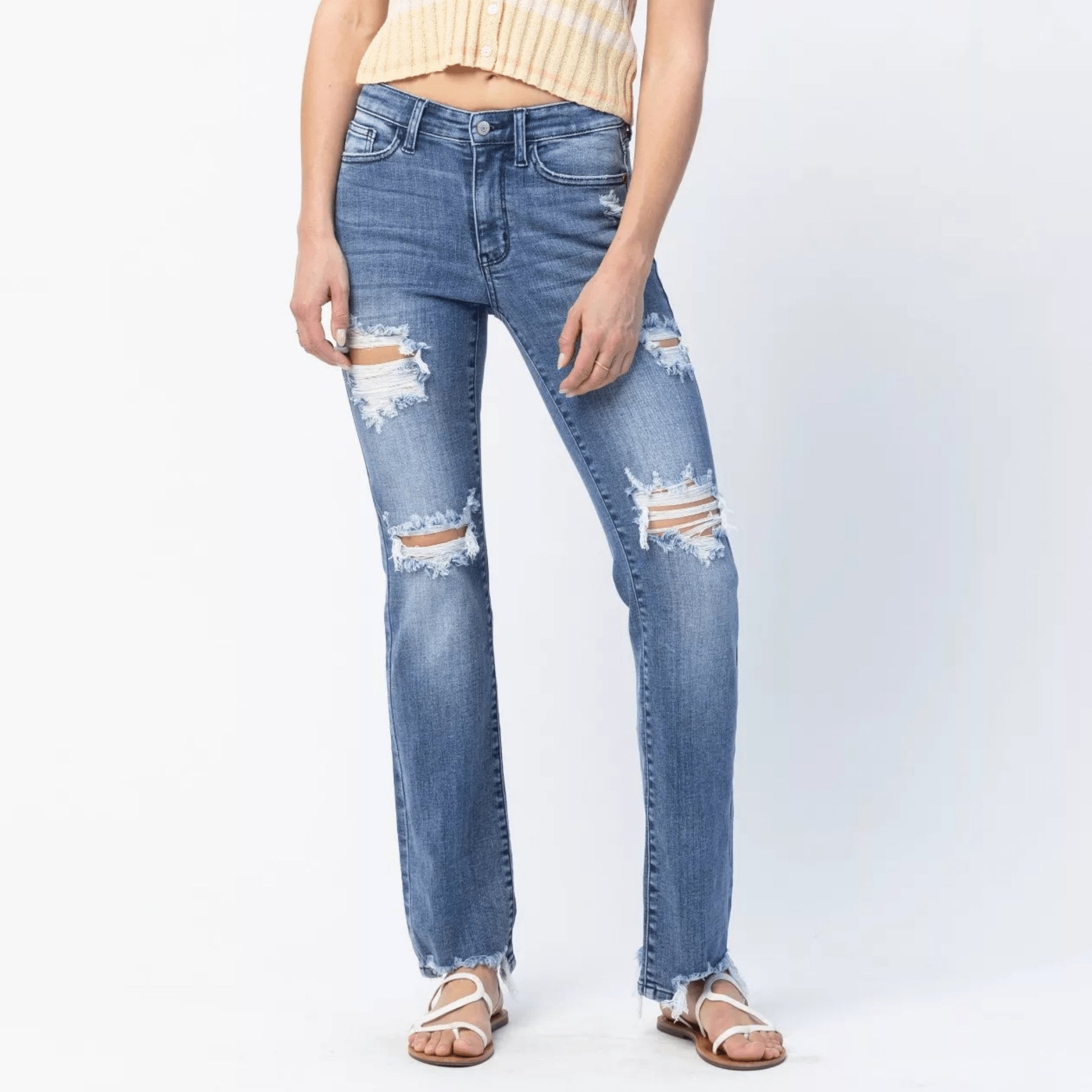Front view of Judy Blue mid-rise destroyed straight leg jeans on a white background.