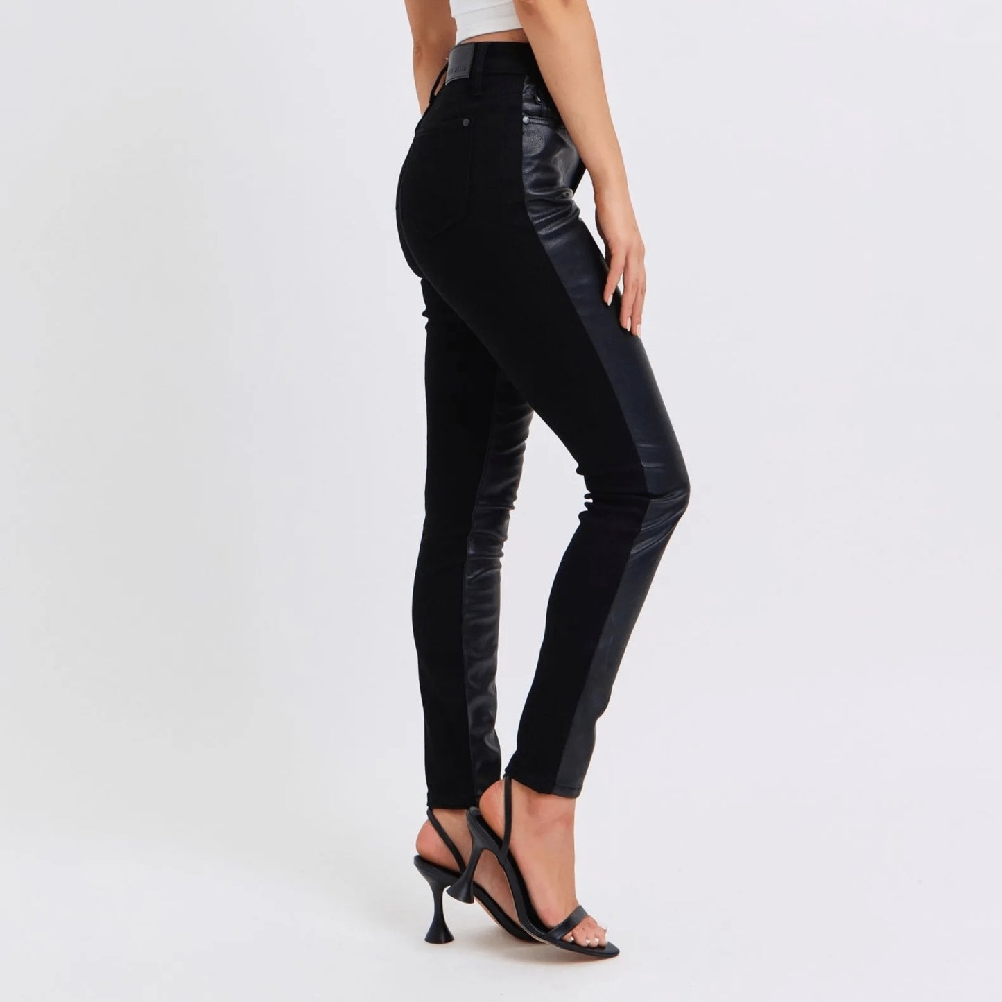 Judy Blue plus size high-waist faux leather skinny pants in a sleek black finish.