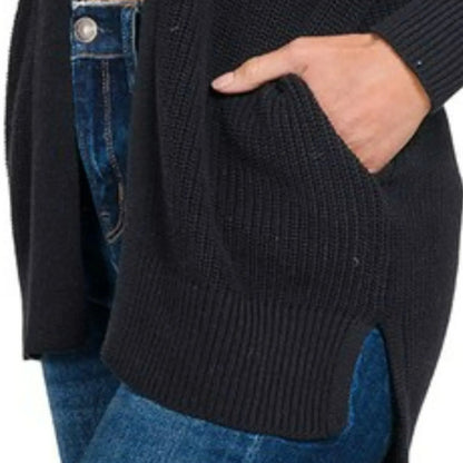 Lifestyle view of the Zenana eyelet open sweater cardigan layered for a casual look.