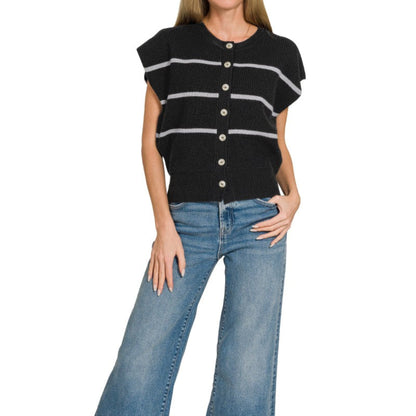 Lifestyle view of the Black striped sweater vest styled for a polished coastal look.