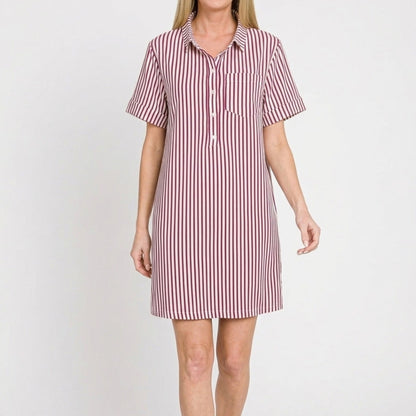 Lifestyle view of the Cabernet striped collared dress styled for a chic, modern coastal look.