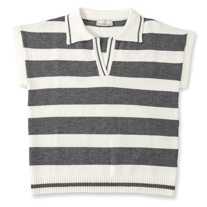 Lifestyle view of the Charcoal striped short sleeve sweater styled for a modern coastal look.