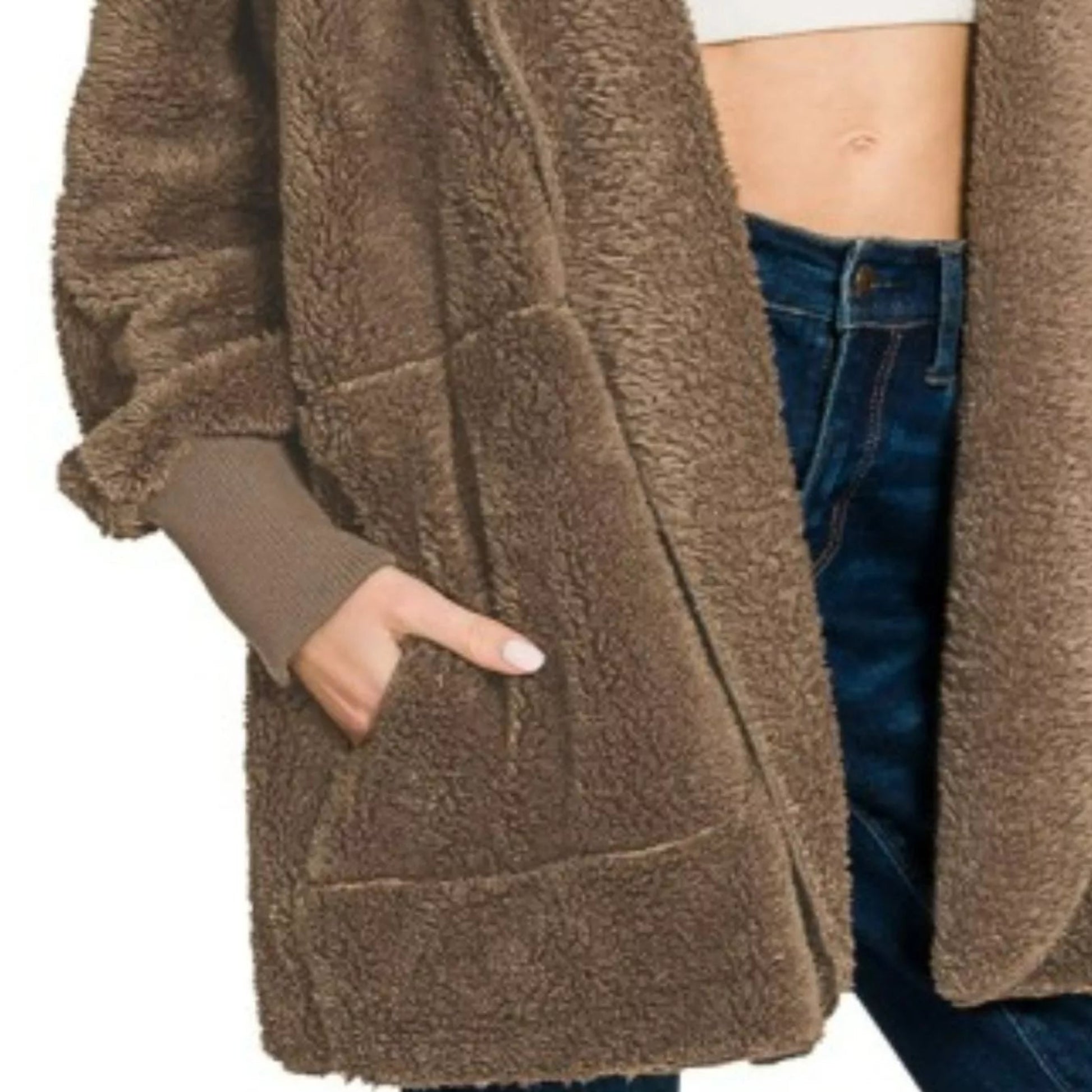 Lifestyle view of the mocha faux fur jacket styled for a cozy boutique look.