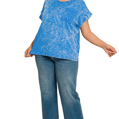 Lifestyle view of the ocean blue folded sleeve tee showing the relaxed boutique silhouette.
