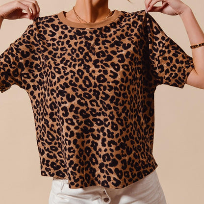 Casual outfit view of the loose-fit SO ME leopard thermal top.