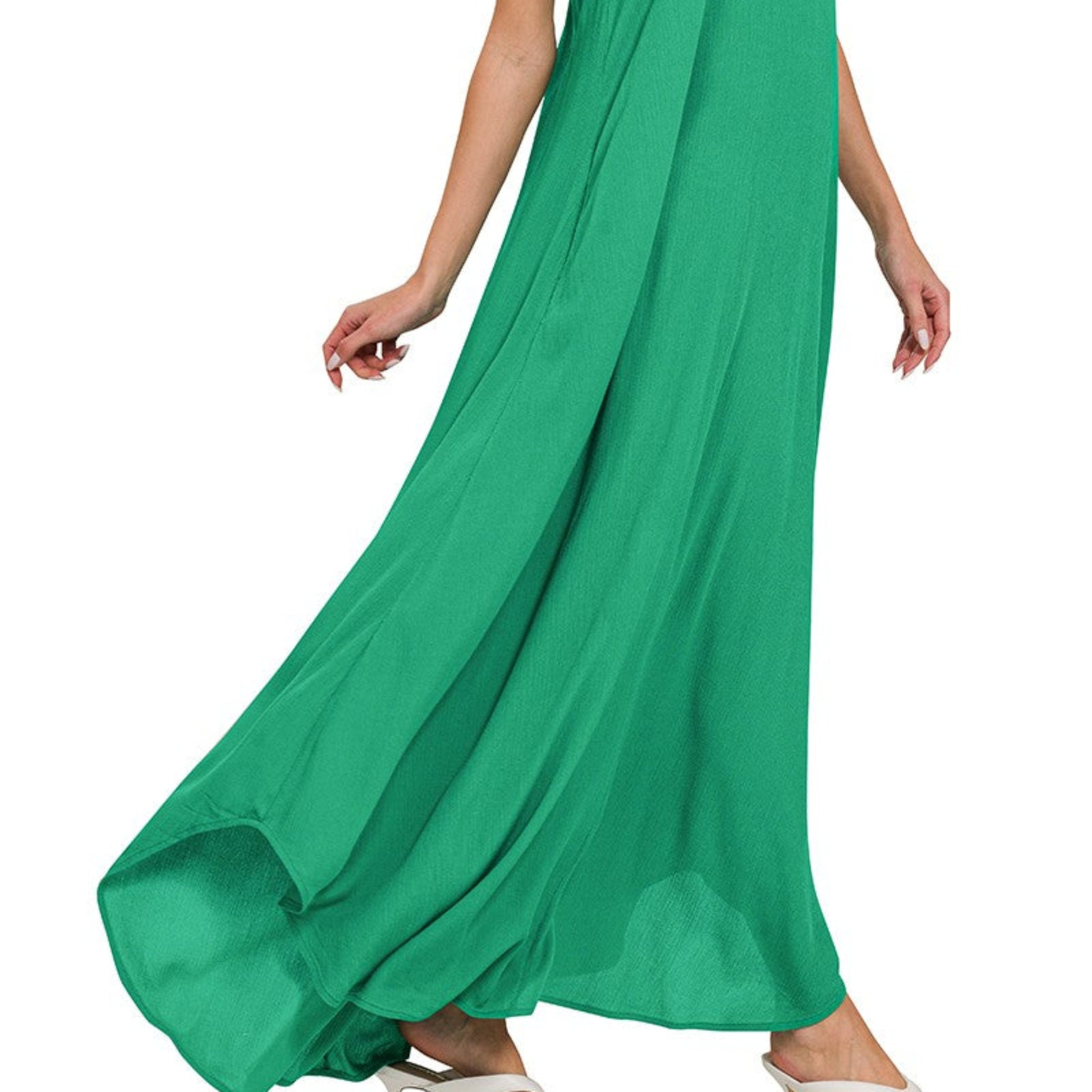 Human lifestyle photo of the Zenana K green dress being worn in a bright, natural coastal setting.