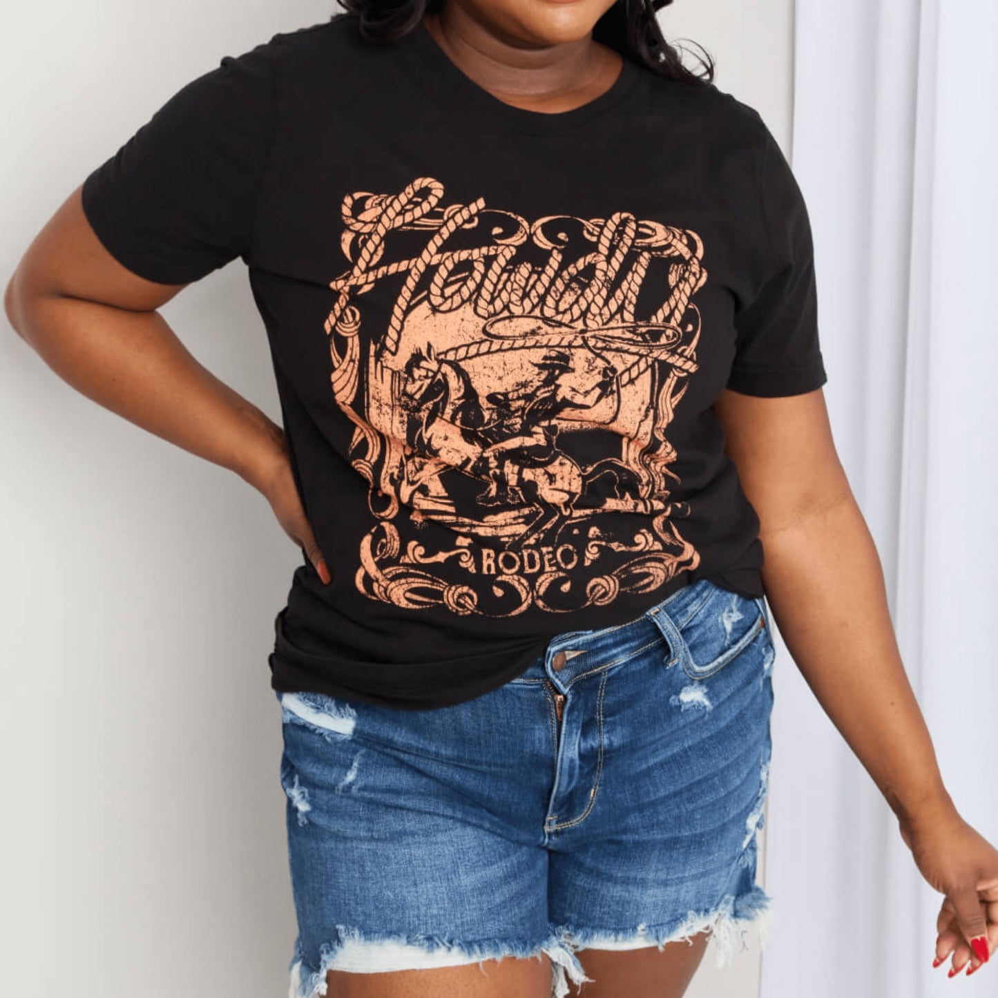 Complete boutique presentation of the mineB "Howdy" tee with Western accessories.