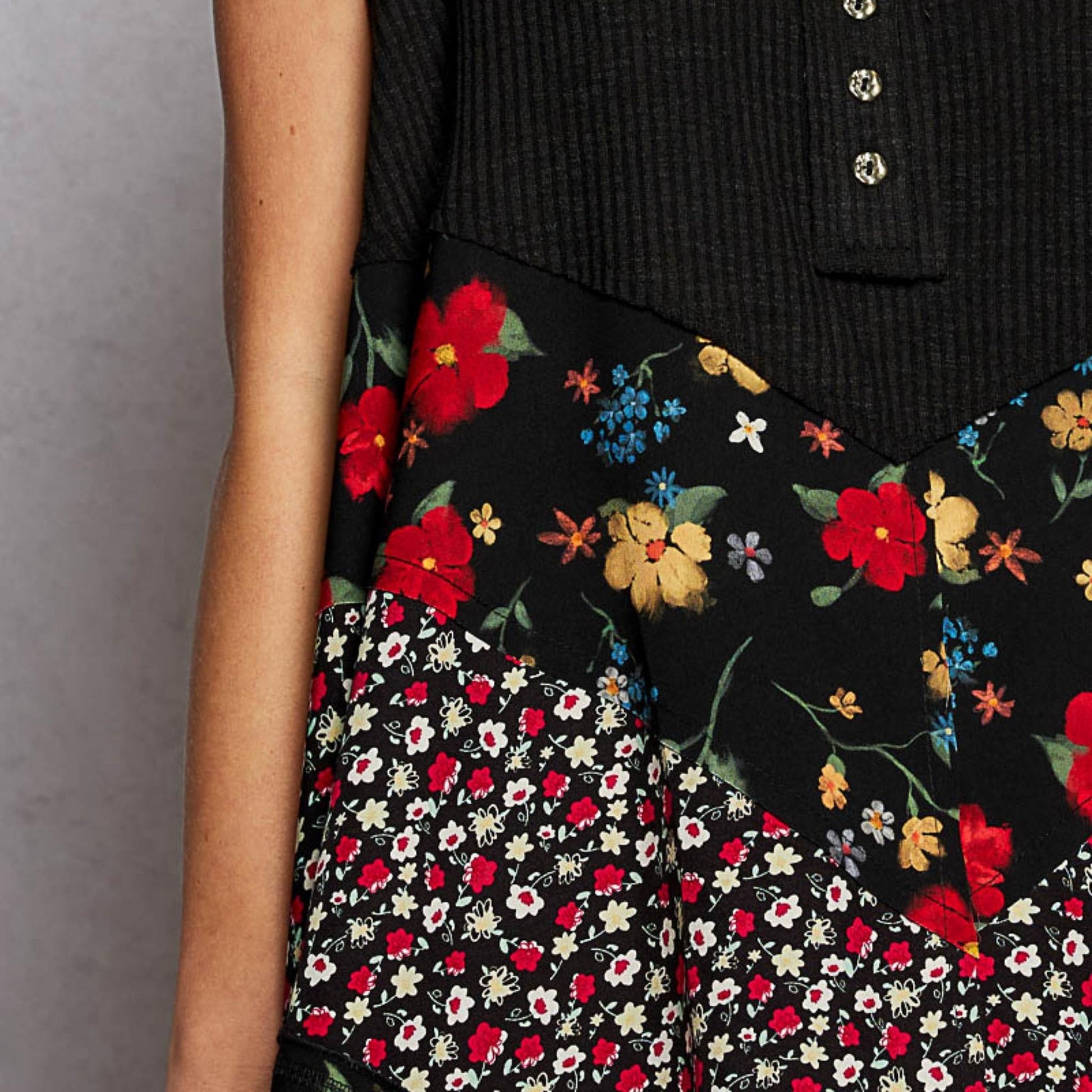 Full presentation of the POL black ribbed tank with woven print patch.