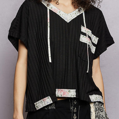 POL black short sleeve hooded top with open back detail — frontal display.